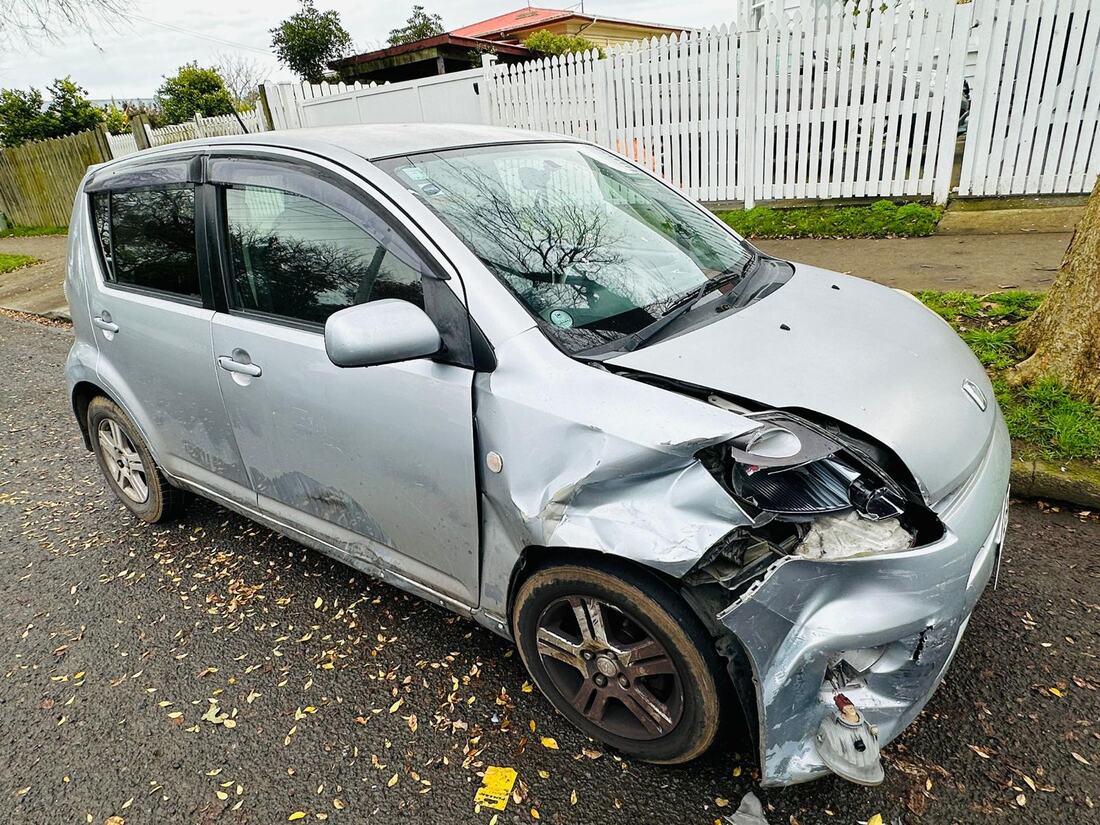 Silver hatchback with a crushed front corner after an accident in Whakatāne