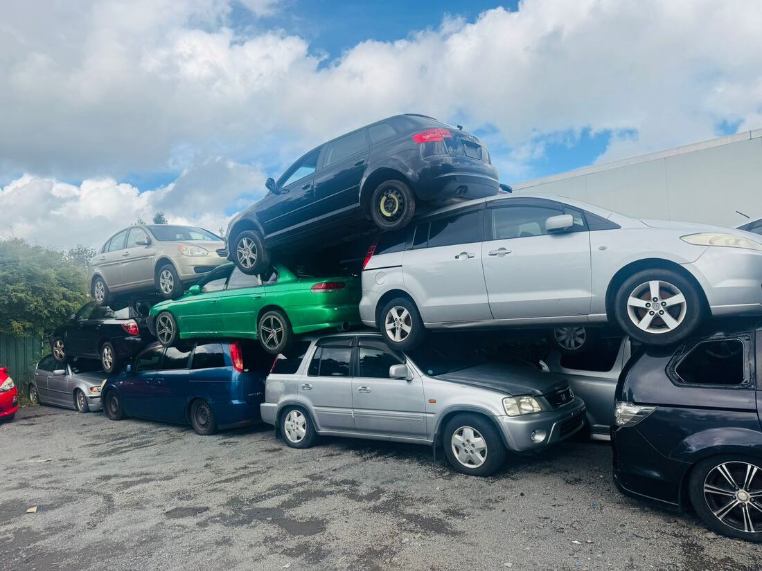 Scrap cars stacked at the yard ready for recycling