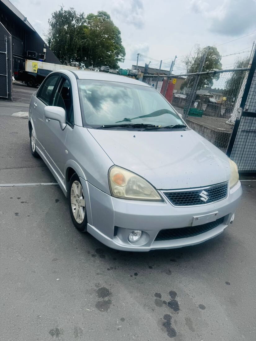 Silver Suzuki hatchback sold for cash with free removal