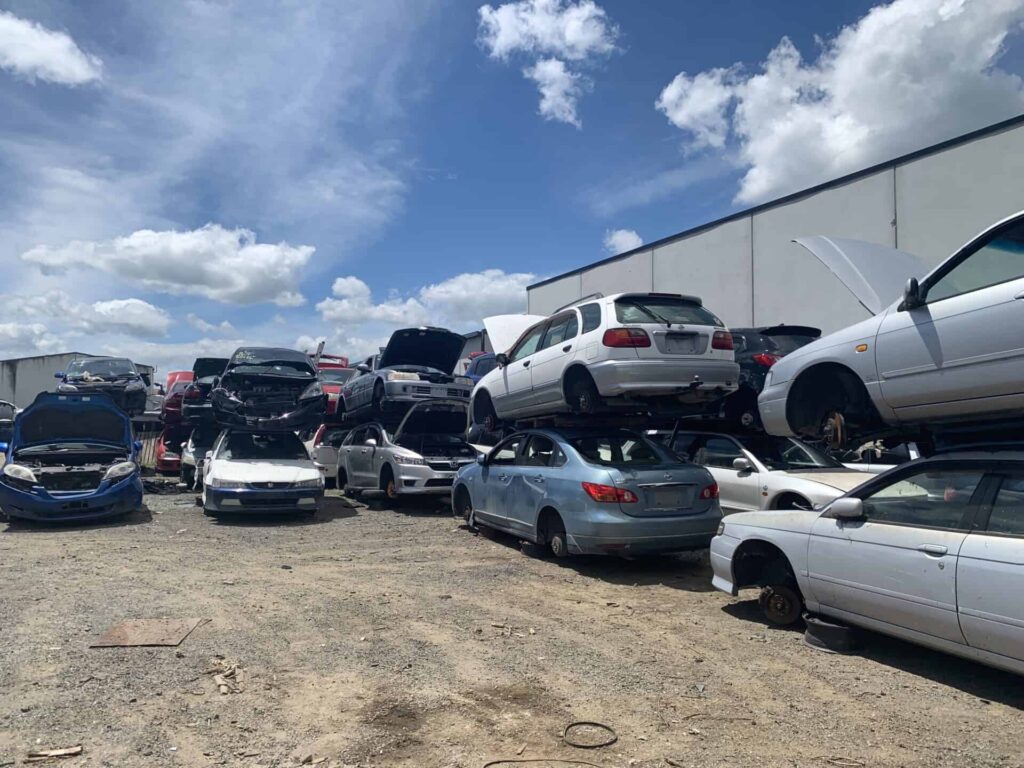 Scrap car yard in Whakatane filled with old and unwanted vehicles