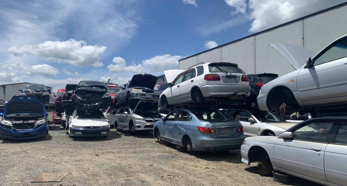 Scrap car yard in Whakatane filled with old and unwanted vehicles